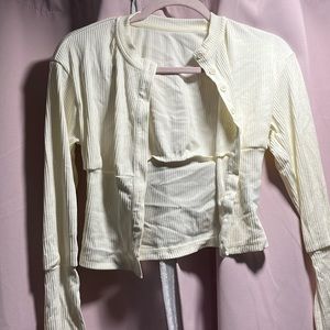 Cute white cardigan or button-down top only worn once in perfect condition.